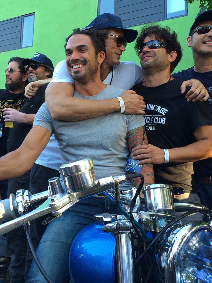 Jason Lewis wins motorcycle and gives it to his buddy
